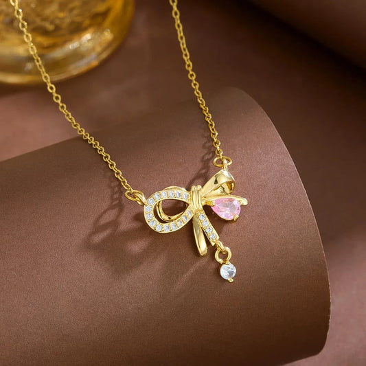 Infinity Bow Pendant Necklace – Gold & Silver |Collection AAS